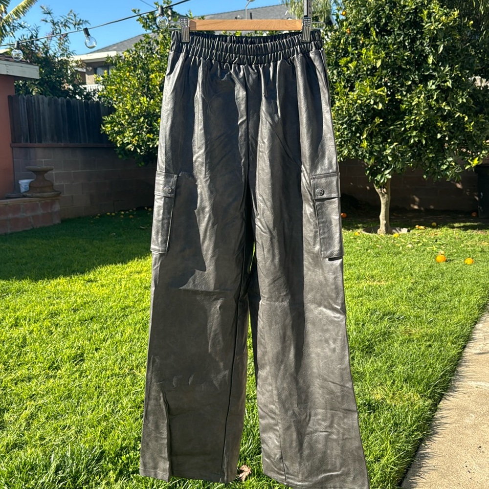 Brown jogger like pants, a leather type brown pants women’s. Size 2
